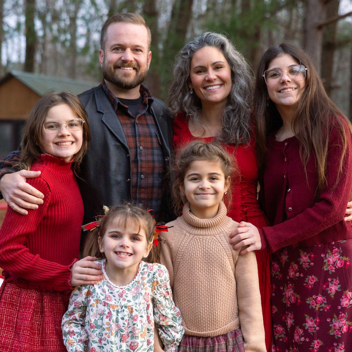Nathan Poole with his wife and four daughters